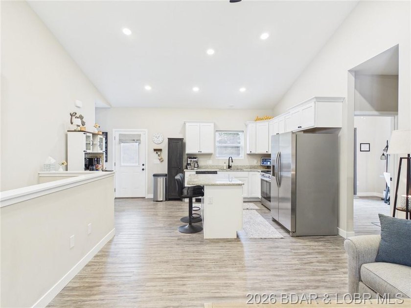Welcome to this spacious 5-bedroom, 4-bath home in the highly - photo 3