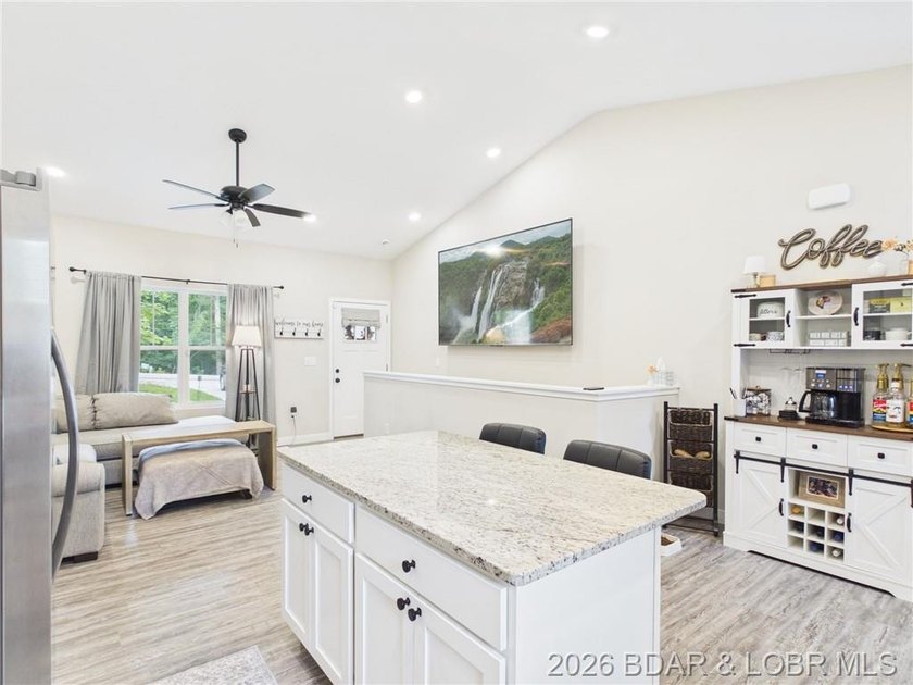Welcome to this spacious 5-bedroom, 4-bath home in the highly - photo 6