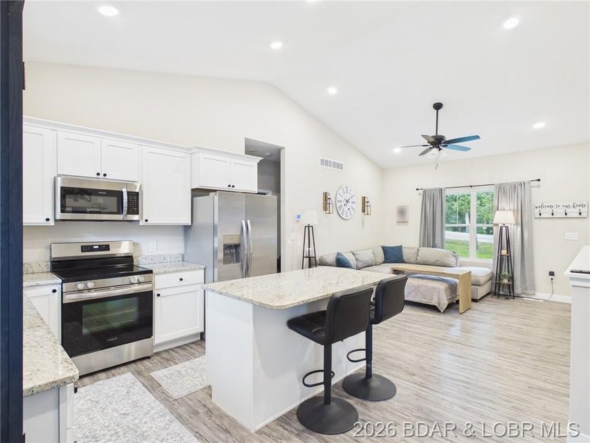 Welcome to this spacious 5-bedroom, 4-bath home in the highly - photo 7