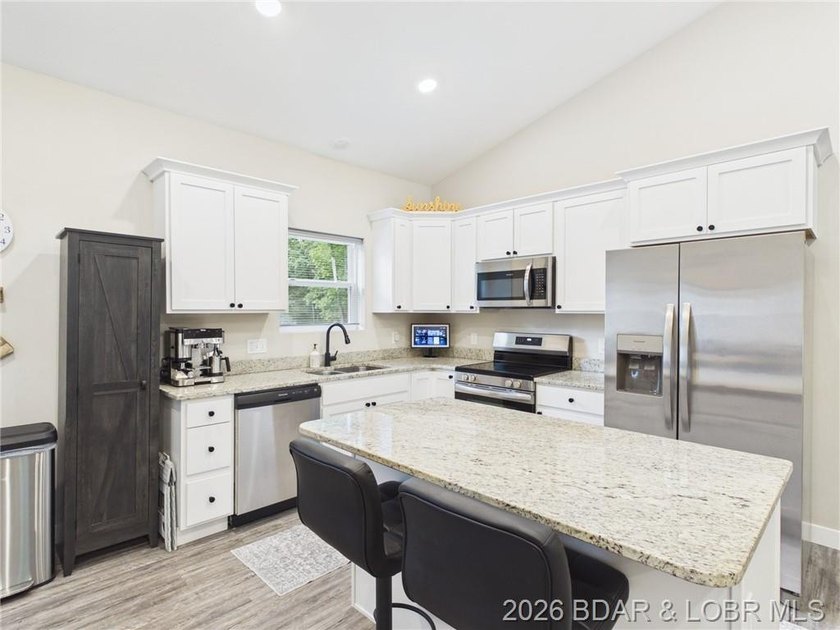 Welcome to this spacious 5-bedroom, 4-bath home in the highly - photo 8