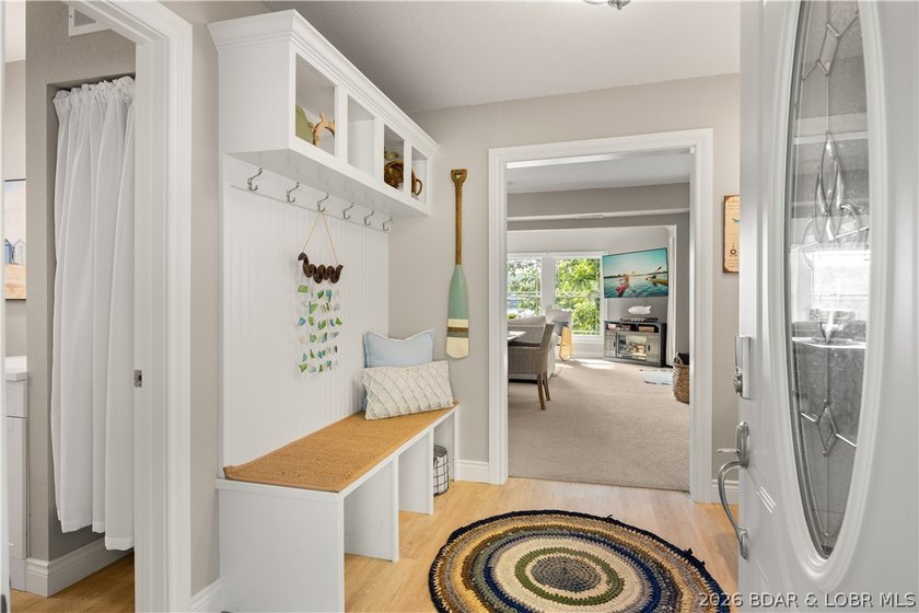 Discover peace and tranquility in this stunning lakefront home - photo 4