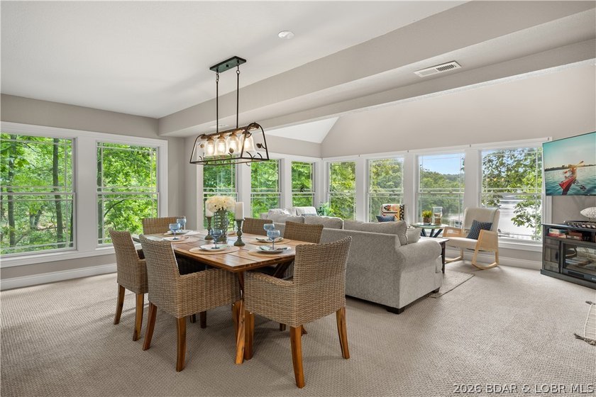 Discover peace and tranquility in this stunning lakefront home - photo 7