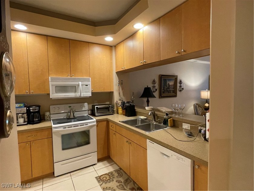 A Must See!!! This meticulous maintained 3rd floor condo is - photo 9