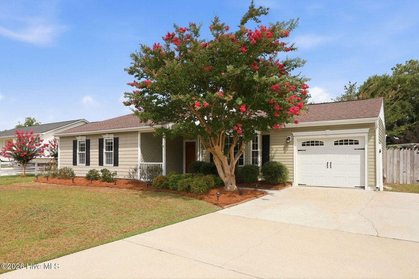 Welcome home to this meticulously maintained 4-bedroom, 2-bath - photo 3