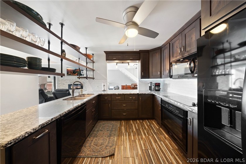 Top-floor lakefront condo offering some of the best views at The - photo 9