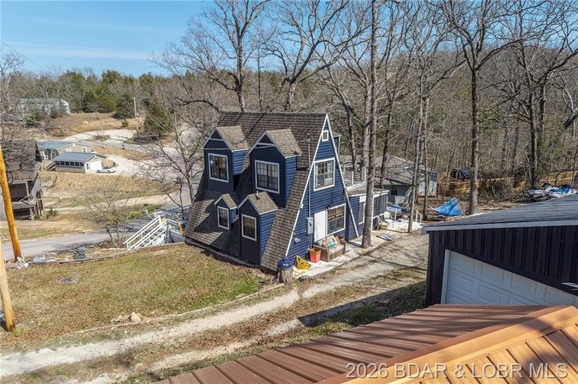 Freshly remodeled, this charming A-frame instantly feels like a - photo 2