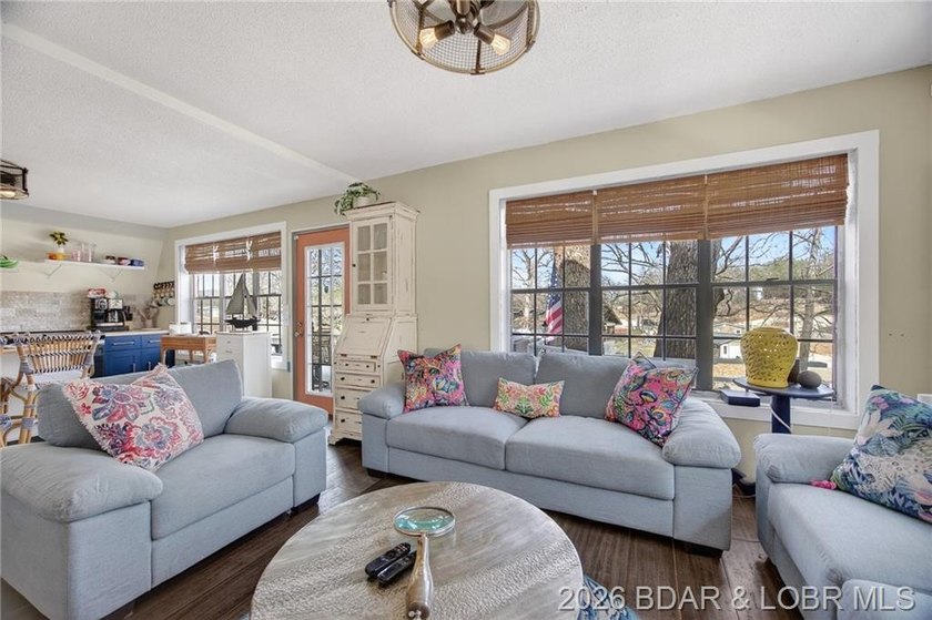 Freshly remodeled, this charming A-frame instantly feels like a - photo 3