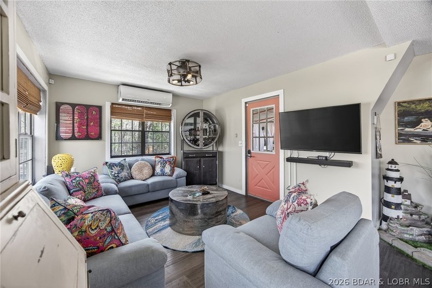 Freshly remodeled, this charming A-frame instantly feels like a - photo 4