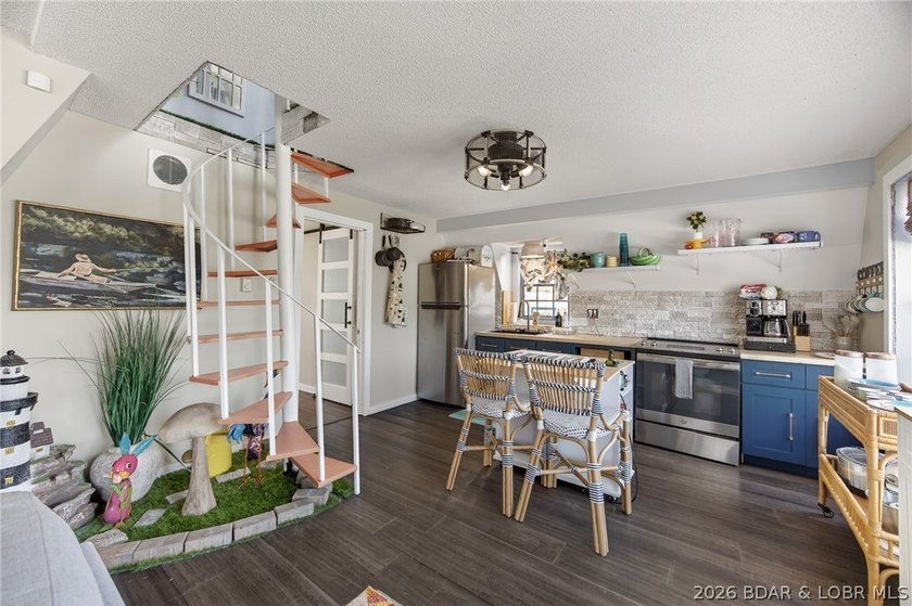 Freshly remodeled, this charming A-frame instantly feels like a - photo 5