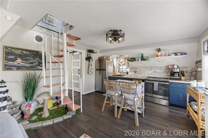 Freshly remodeled, this charming A-frame instantly feels like a - photo 5
