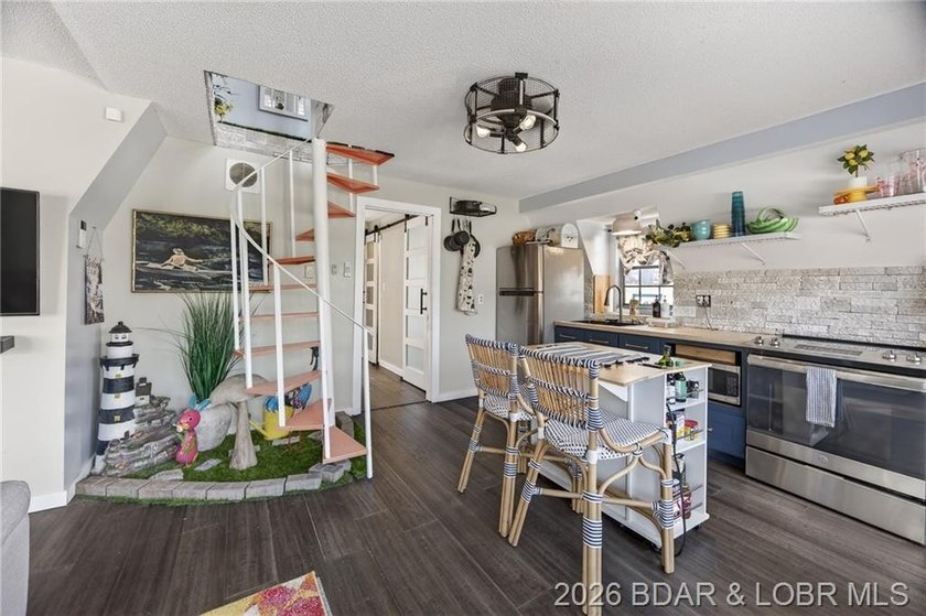 Freshly remodeled, this charming A-frame instantly feels like a - photo 6