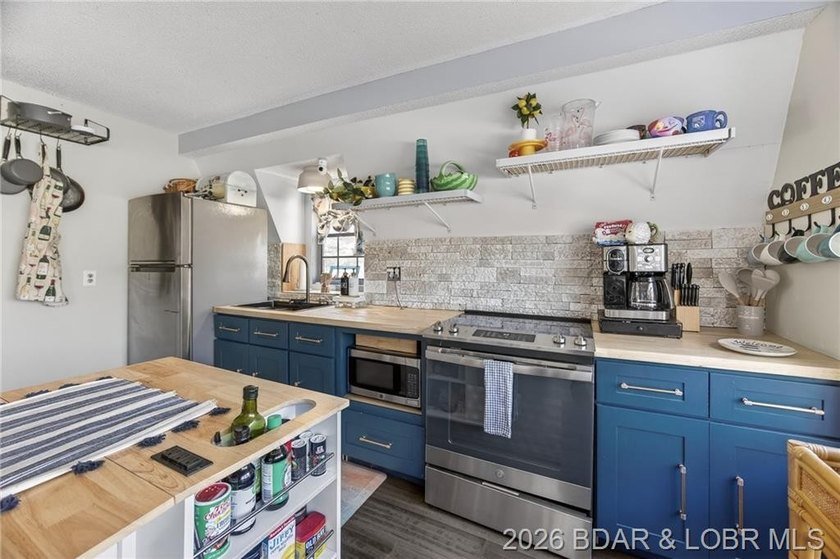 Freshly remodeled, this charming A-frame instantly feels like a - photo 9