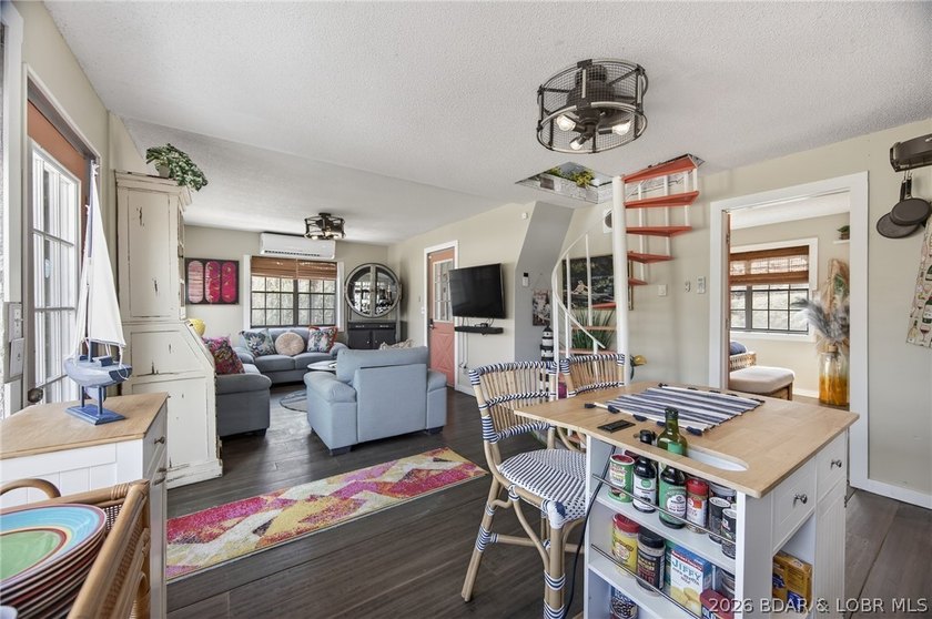 Freshly remodeled, this charming A-frame instantly feels like a - photo 10