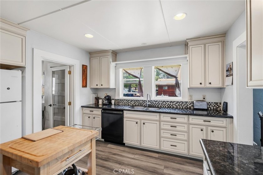 Charming and inviting, this 3-bedroom, 1-bath home offers a - photo 18