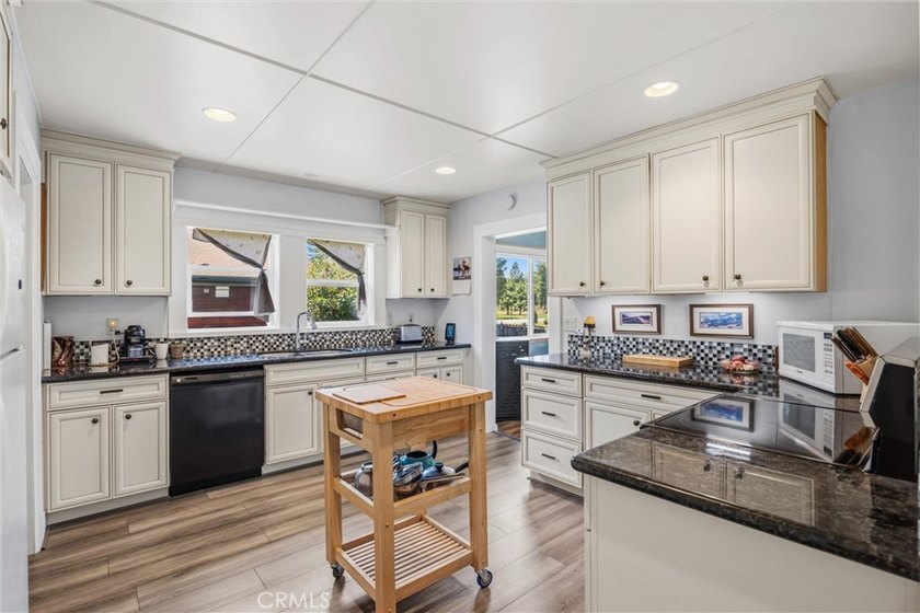 Charming and inviting, this 3-bedroom, 1-bath home offers a - photo 19