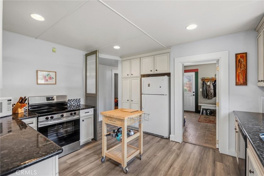 Charming and inviting, this 3-bedroom, 1-bath home offers a - photo 20