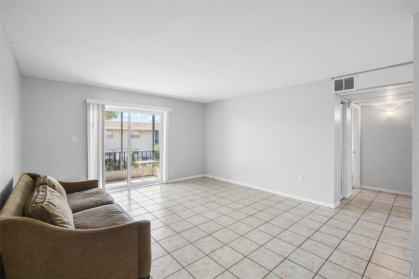 Virtually Staged. Two-bedroom condominium on the top floor with - photo 15