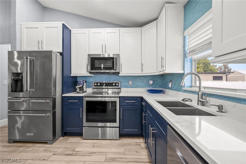 Welcome to your dream home in the heart of Cape Coral! This - photo 14
