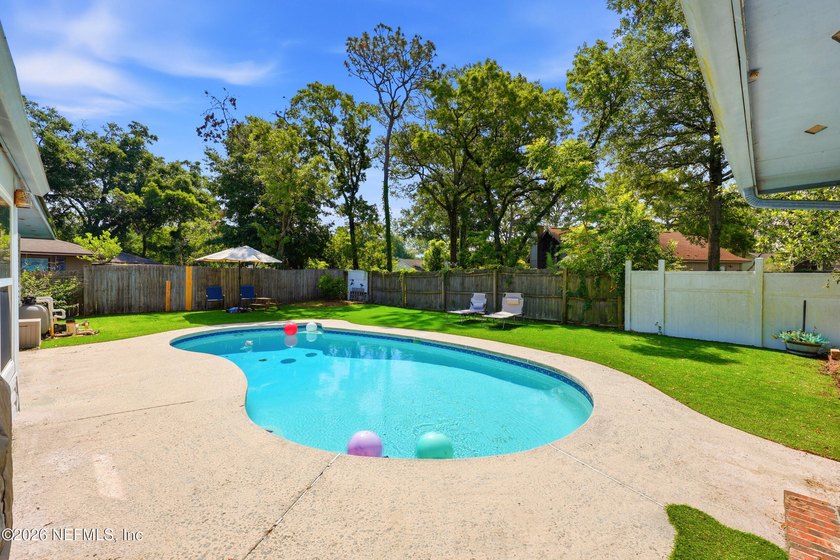Welcome home to this inviting pool home with a with a brand new - photo 35