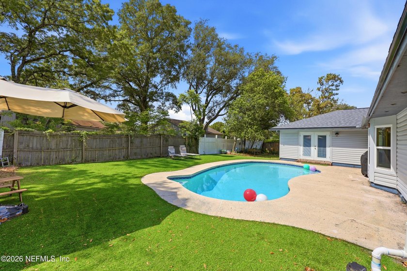 Welcome home to this inviting pool home with a with a brand new - photo 38