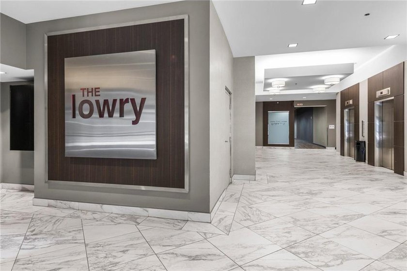 This beautifully updated Lowry condo offers multiple scenic - photo 2
