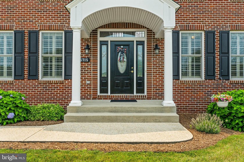 Experience timeless craftsmanship and exceptional living in this - photo 3