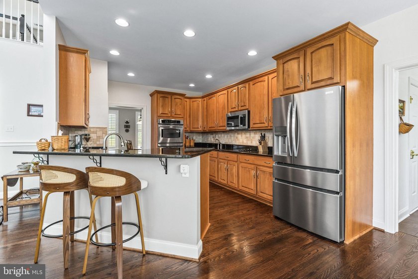 Experience timeless craftsmanship and exceptional living in this - photo 10
