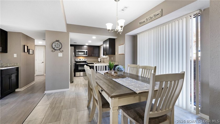 Welcome to this beautifully updated, move-in ready villa in one - photo 7