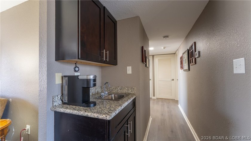 Welcome to this beautifully updated, move-in ready villa in one - photo 8