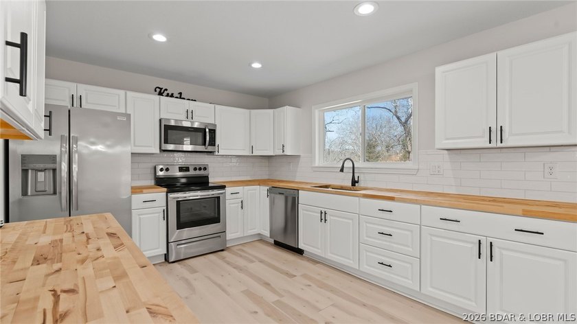 Lake view home with modern updates! This newly remodeled home - photo 8