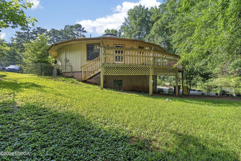Welcome to one of Forsyth's most distinctive homes! This - photo 6