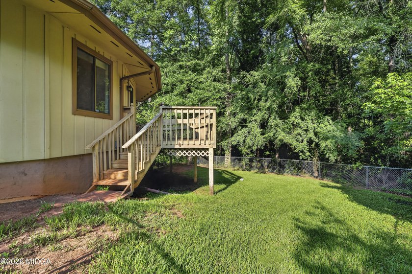 Welcome to one of Forsyth's most distinctive homes! This - photo 8