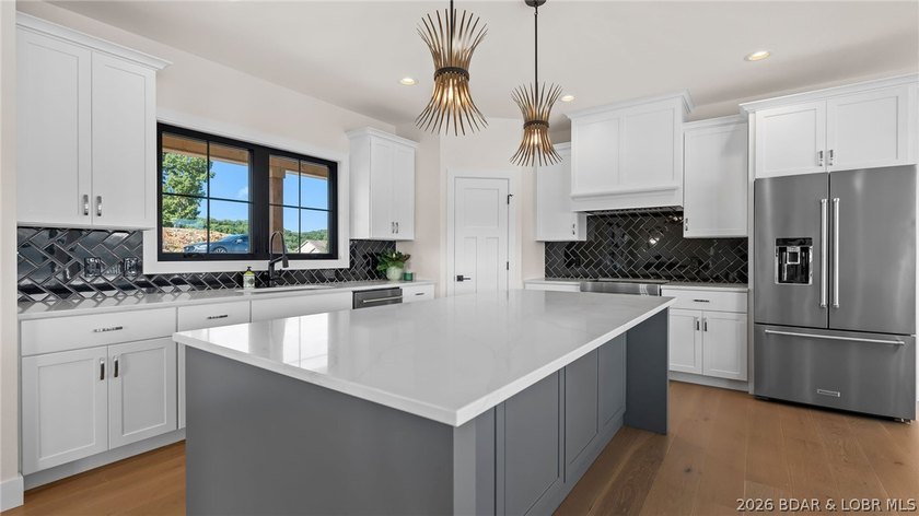NEW CONSTRUCTION! Unobstructed lake views and luxury living - photo 4
