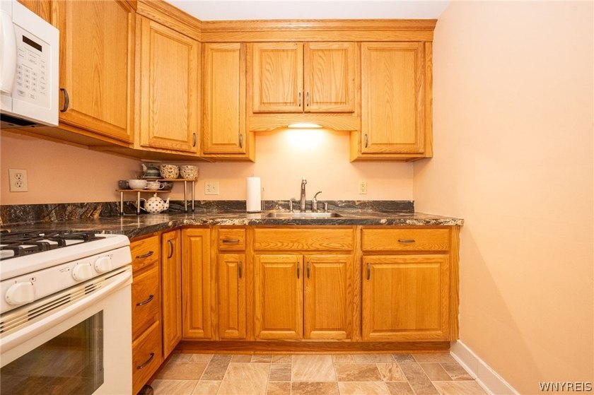 Welcome home to this charming Cape Cod nestled in the heart of - photo 11