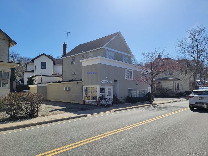 Mixed-use property in the Village of Roslyn. Includes 2 retail - photo 2