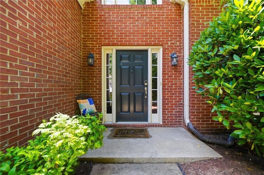 You'll love this charming 4-bedroom, 3.5-bath home in the highly - photo 3