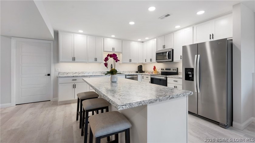 Investment potential meets lake living in this newly constructed - photo 16