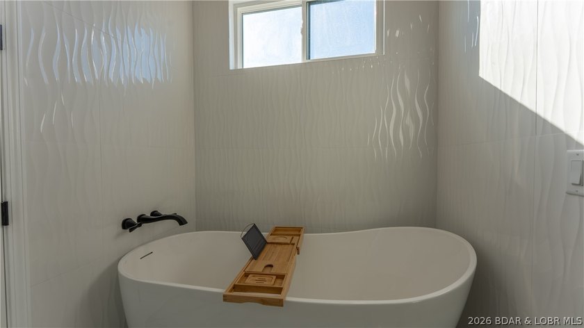 Investment potential meets lake living in this newly constructed - photo 28