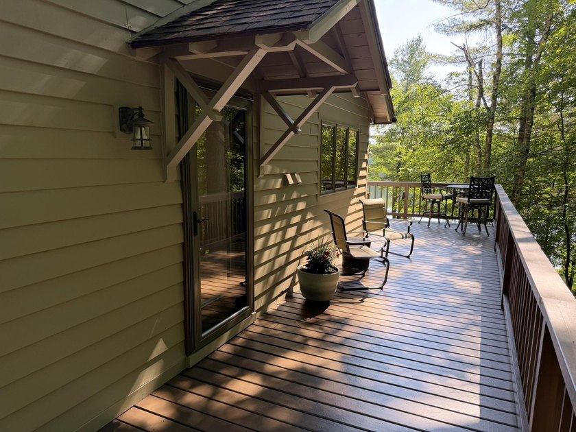 BIRD LAKE CHARMER. Tucked in the woods, this year-round home - photo 23