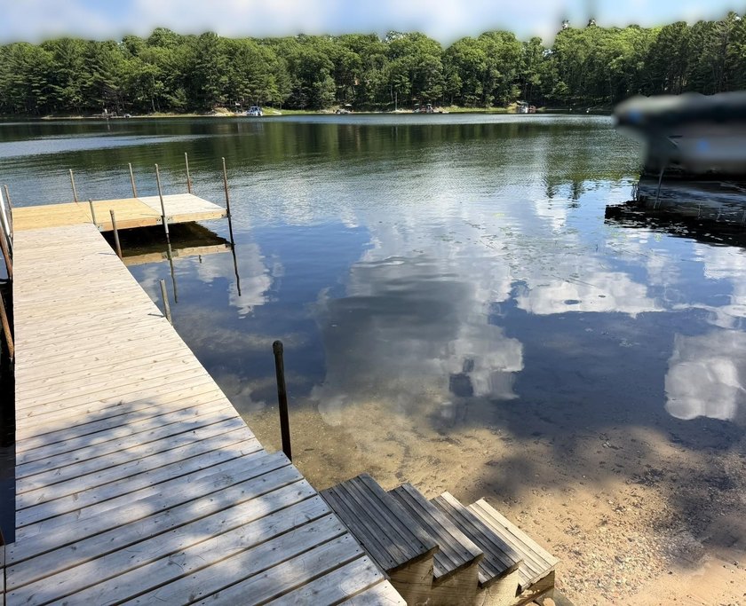 BIRD LAKE CHARMER. Tucked in the woods, this year-round home - photo 38