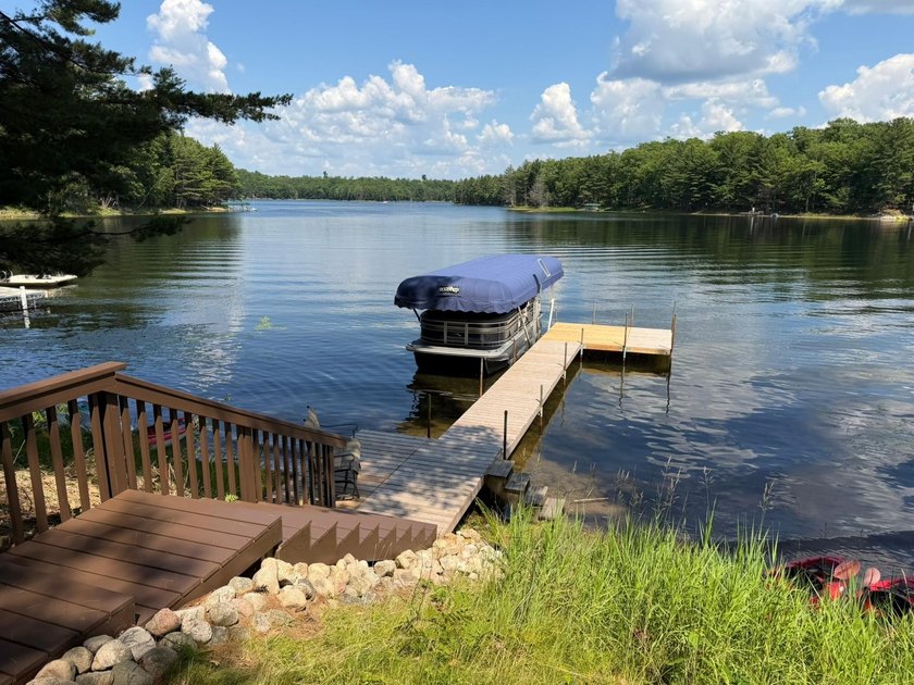 BIRD LAKE CHARMER. Tucked in the woods, this year-round home - photo 39