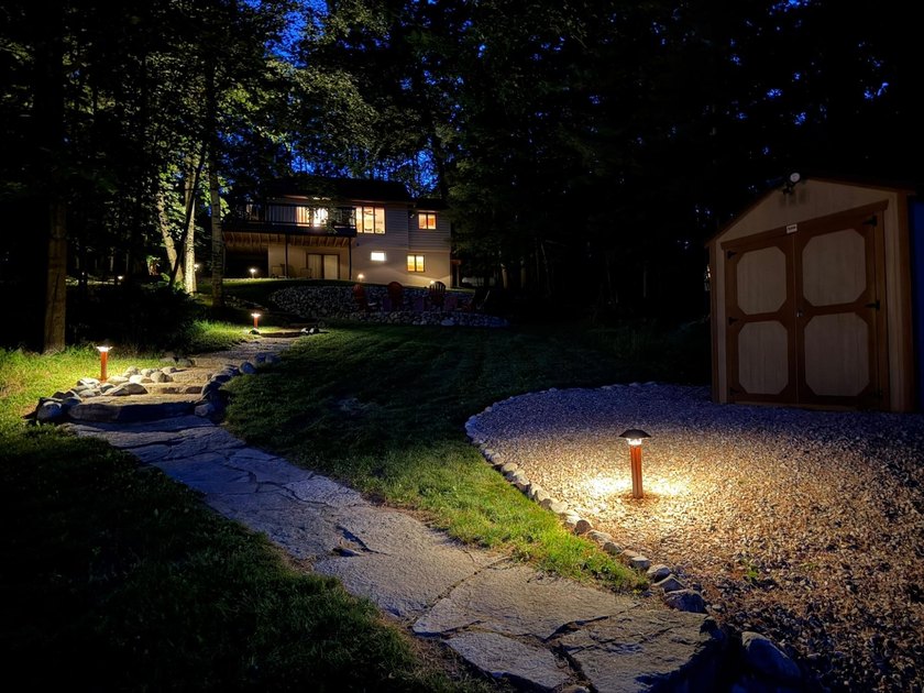 BIRD LAKE CHARMER. Tucked in the woods, this year-round home - photo 43