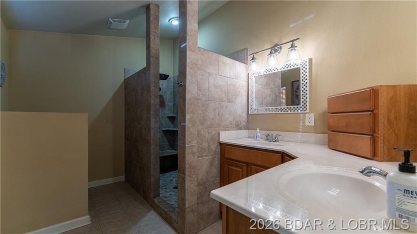 Welcome to this beautifully maintained 4-bedroom, 2 full and 1 - photo 7