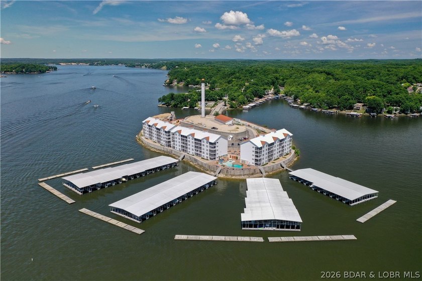 Location, views, and value-this top floor, end-unit condo at - photo 7