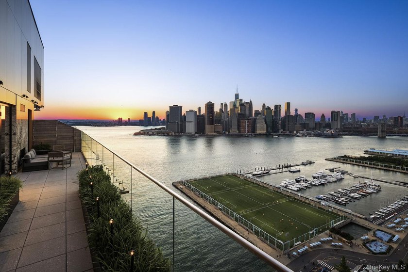 Welcome to Quay Tower, an exceptional waterfront residence in - photo 12