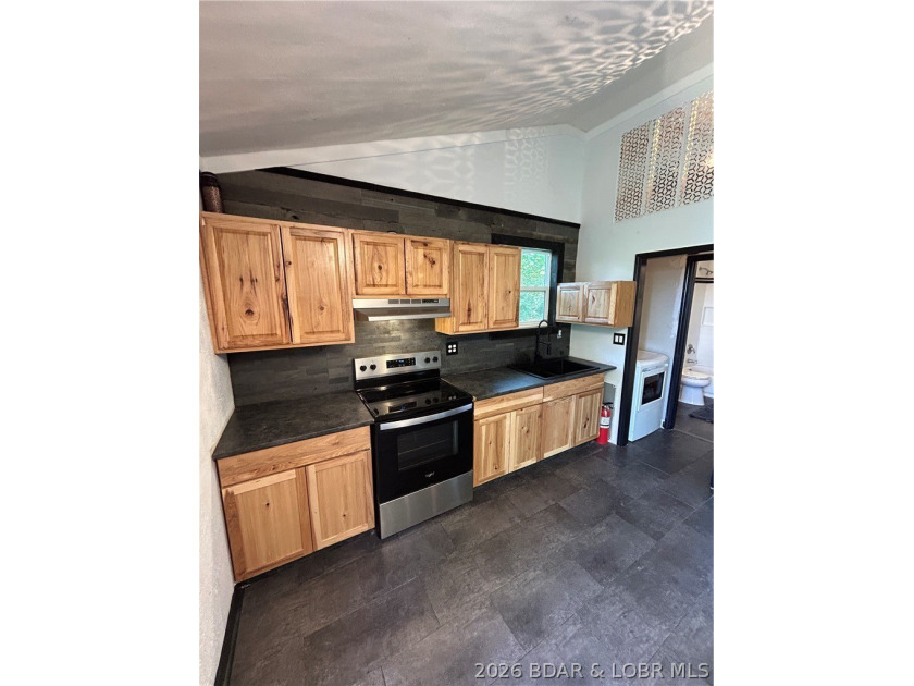 Wow what a great home! The new one level home has a great - photo 11