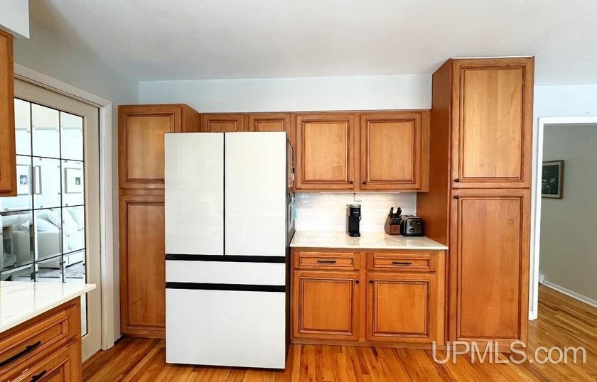 Nestled in one of Marquette's most desirable neighborhoods, this - photo 11