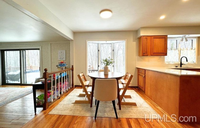 Nestled in one of Marquette's most desirable neighborhoods, this - photo 13