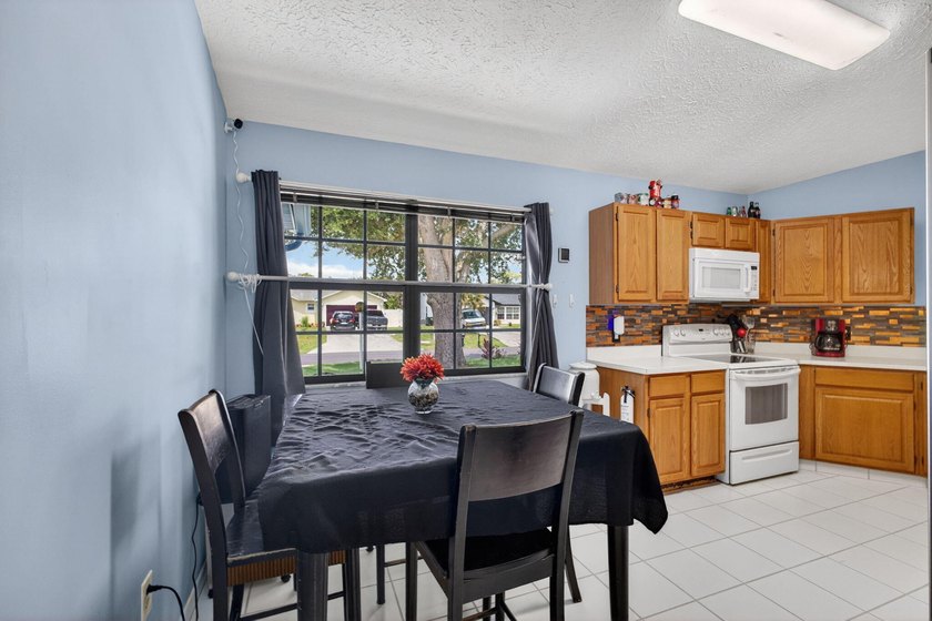 Welcome to this charming single-story residence in Port st Lucie - photo 19
