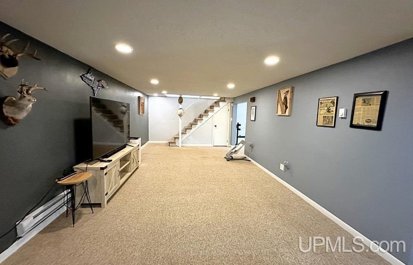 Nestled in one of Marquette's most desirable neighborhoods, this - photo 35